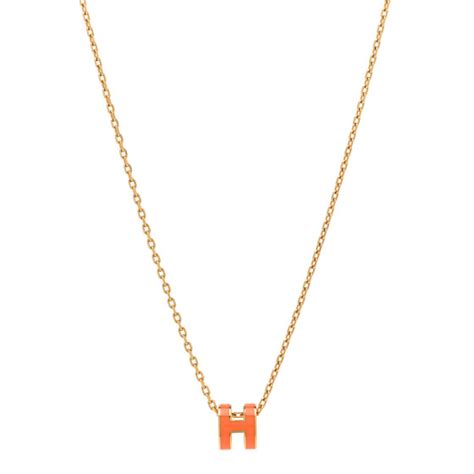 hermes lacquered gold mini pop h.